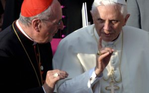 COLOGNE, Germany: Pope Benedict XVI (R) talks to Cologne's Archbishop Joachim Meisner outside Cologne's Cathedral, Germany, 18 August 2005, on the first of his groundbreaking four-day visit to his native Germany, his first visit abroad since his election as pope in April. More than 400,000 young Catholics from nearly 200 countries were set to welcome the new pope to the Catholic stronghold of Cologne for the 20th edition of the World Youth Day celebration. AFP PHOTO FREDERICO GAMBARINI/POOL (Photo credit should read FREDERICO GAMBARINI/AFP/Getty Images)