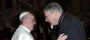Cardinal George Pell of Sydney greets Pope Francis during his audience with cardinals March 15 at the Vatican. (CNS photo/L'Osservatore Romano) (April 9, 2013)