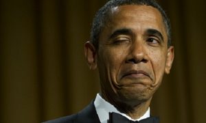 US President Barack Obama winks as he tells a joke about his place of birth during the White House Correspondents Association Dinner in Washington, DC, April 28, 2012. The annual event, which brings together US President Barack Obama, Hollywood celebrities, news media personalities and Washington correspondents, features comedian Jimmy Kimmel as the host. AFP PHOTO / Saul LOEB (Photo credit should read SAUL LOEB/AFP/GettyImages)