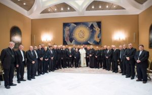 Pope Francis poses for a photo with Chilean bishops at the Vatican May 17. (CNS photo/Vatican Media) See POPE-CHILE-BISHOPS-LETTER May 17, 2018.