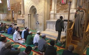 In this picture taken on May 15, 2015 and made available on Friday, May 22, 2015, Muslims gather to pray inside the former Misericordia Abbey in Venice, Italy. Venice officials have ordered the closure of a working mosque set up as Iceland's exhibit for the 56th Venice Biennale contemporary art fair in what was once a Catholic church. (AP Photo/Luigi Costantini)