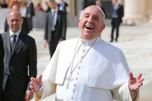 Pope_Francis_laughing_outside_of_St_Peters_Basilica_during_the_general_audience_on_April_1_2015_Credit_Bohumil_Petrik_CNA_4_1_15