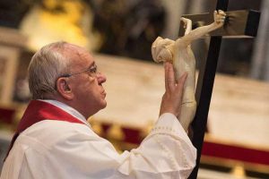 Pope_Francis_and_the_cross_at_the_Liturgy_of_the_Lords_Passion_at_St_Peters_Basilica_on_April_3_2015_Credit_LOsservatore_Romano_CNA_4_3_15
